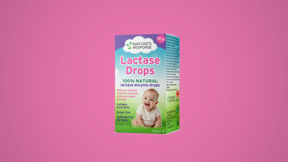 Natural lactase drops product box against a soft pink background—helps soothe and digest baby’s lactose intolerance